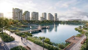 Phối cảnh cụm tháp căn hộ Forestia bên hồ nước với đường dạo bộ và cầu gỗ