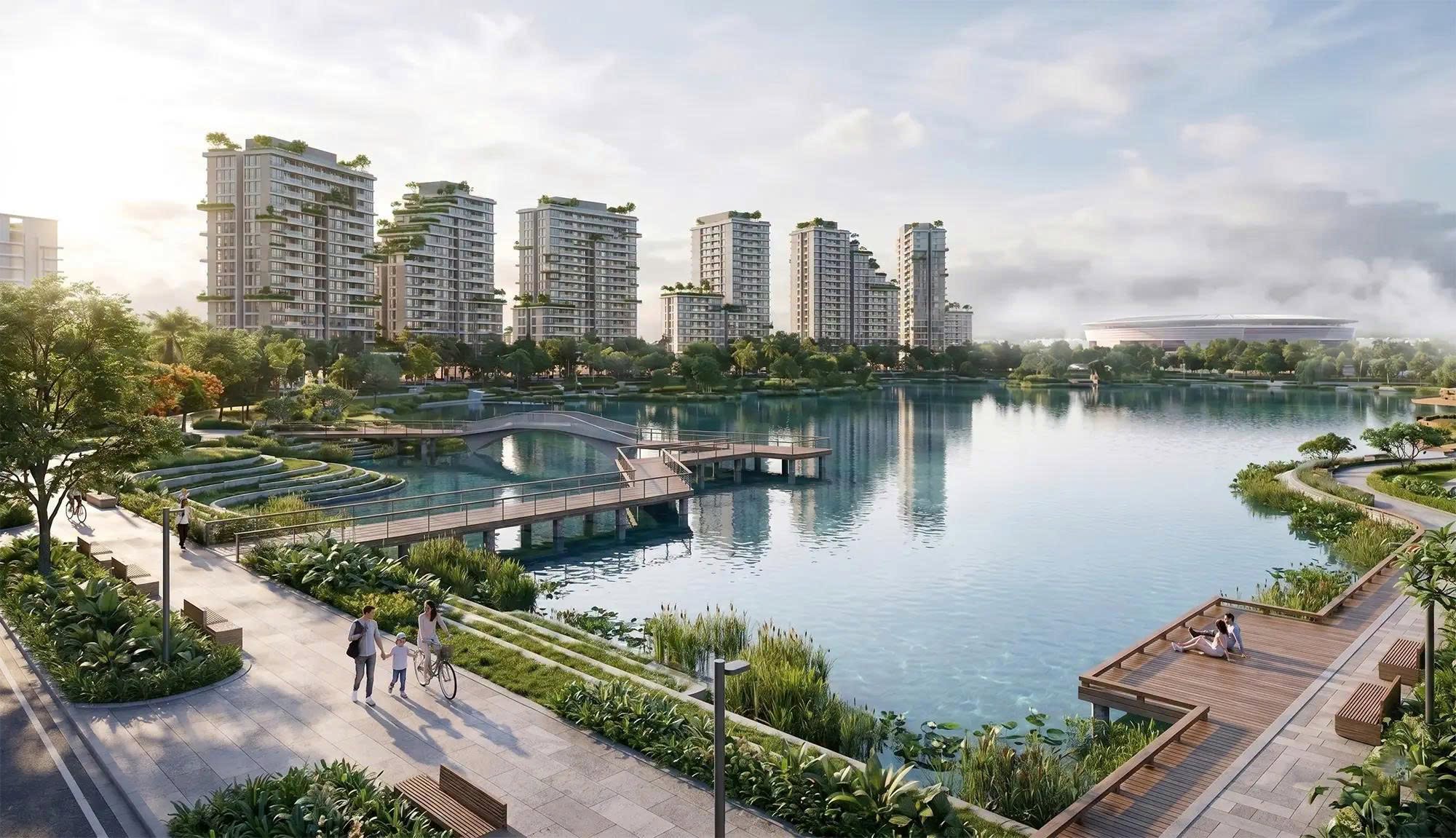 Phối cảnh cụm tháp căn hộ Forestia bên hồ nước với đường dạo bộ và cầu gỗ